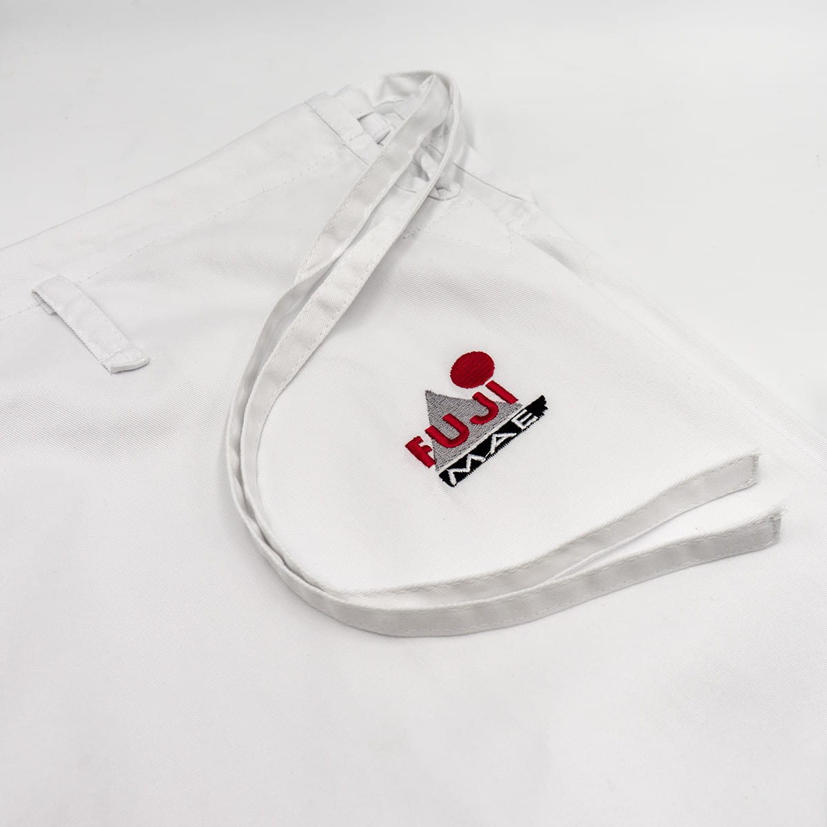 Pas spodni karate Kyokushin FUJIMAE – gumka lub troczki