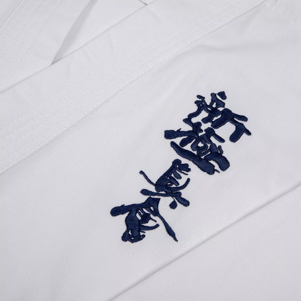Zblizenie na material kimona karate FUJIMAE 9 oz